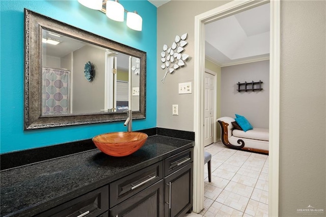 bathroom with vanity and tile patterned flooring