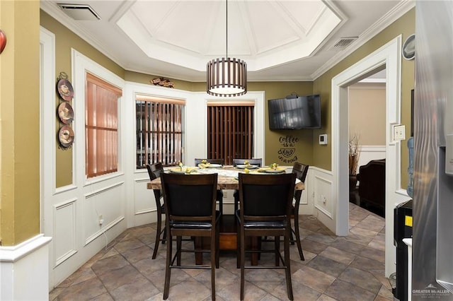 dining room with crown molding