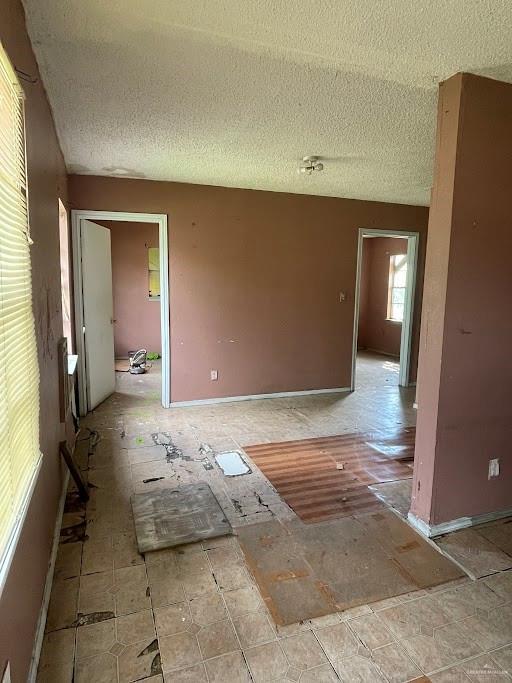 spare room featuring a textured ceiling