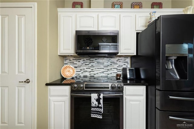 kitchen featuring tasteful backsplash, white cabinets, and appliances with stainless steel finishes