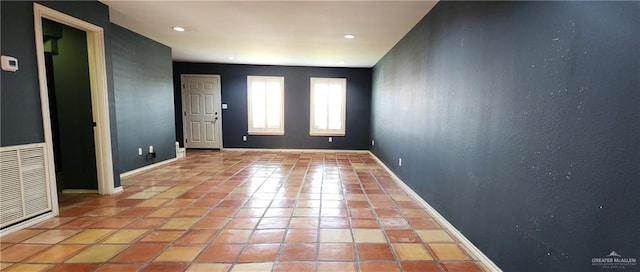 view of tiled spare room