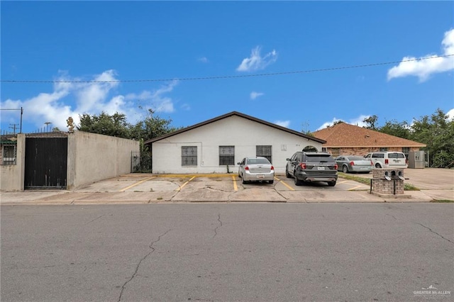 2113 Dallas Ave, Mcallen, TX 78501 - view of front of home with fence and uncovered parking