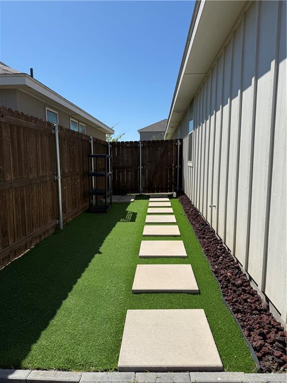 view of yard featuring fence