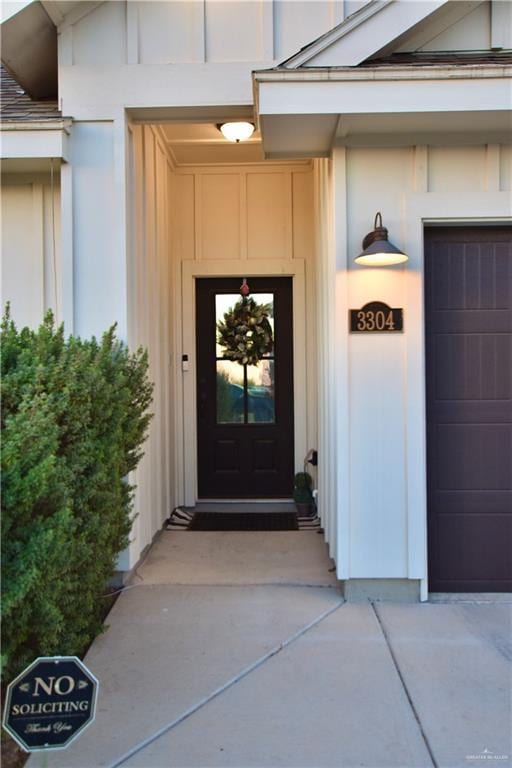 property entrance with an attached garage