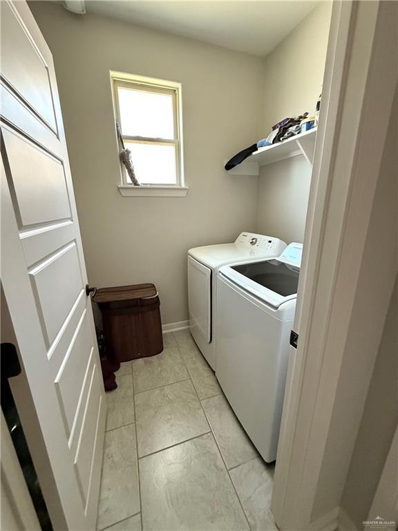 laundry area featuring laundry area and washing machine and dryer