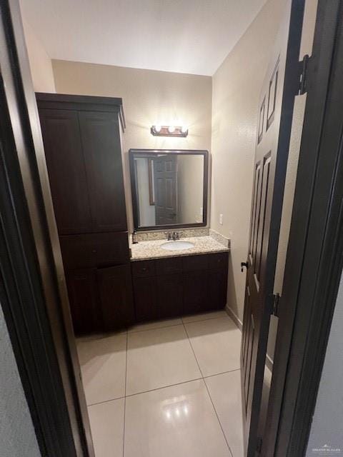 bathroom featuring vanity and tile patterned floors