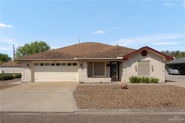 single story home featuring a garage