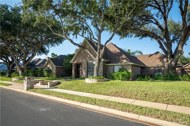 view of front of home with a front yard