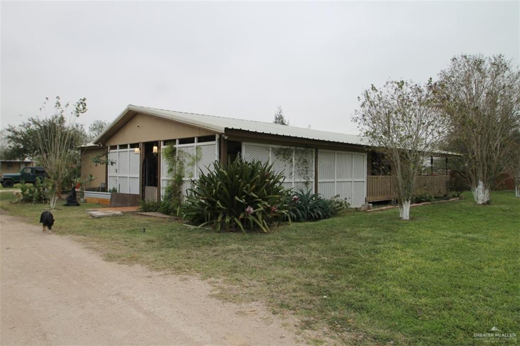 view of property exterior featuring a yard