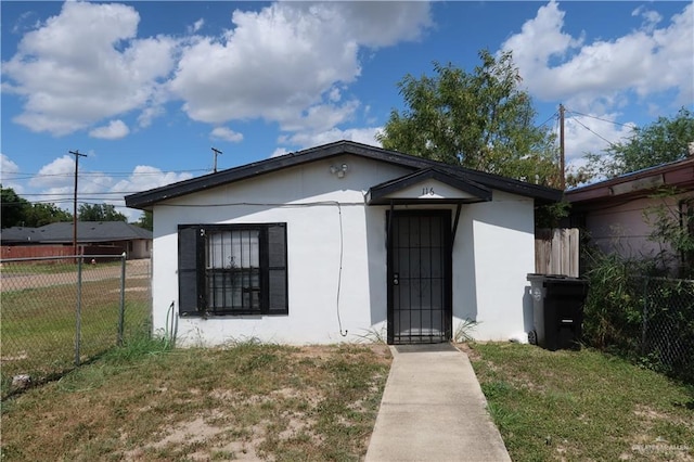 116 N Kansas Ave, Weslaco, TX 78596 - bungalow with stucco siding
