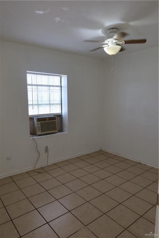 116 N Kansas Ave, Weslaco, TX 78596 - unfurnished room with cooling unit, a ceiling fan, and baseboards