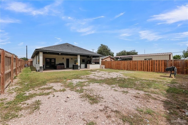 308 N Holland Ave, Mission, TX 78572 - back of house featuring a fenced backyard and a patio