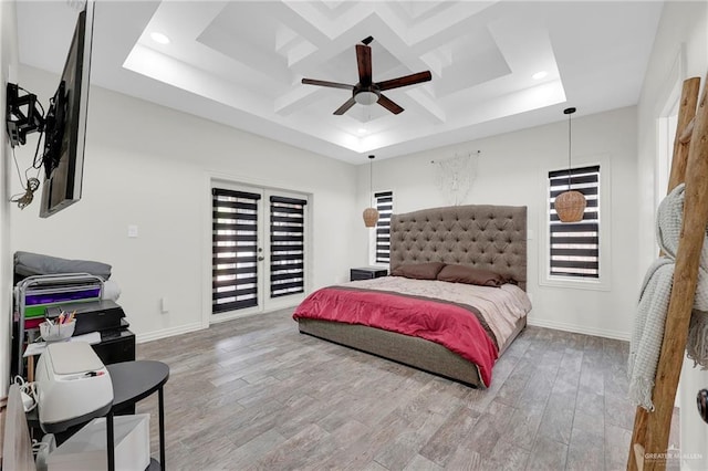 308 N Holland Ave, Mission, TX 78572 - bedroom with coffered ceiling, multiple windows, wood finished floors, access to exterior, and recessed lighting
