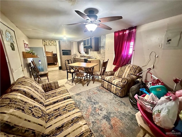 living room with ceiling fan