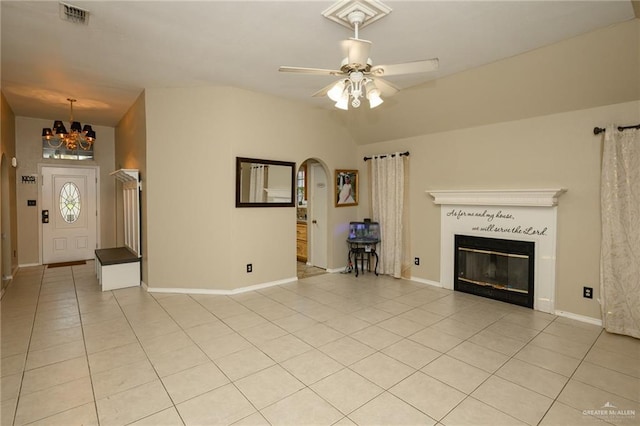 1905 N 8th St, Harlingen, TX 78550 - unfurnished living room featuring light tile patterned floors, a chandelier, ceiling fan, and baseboards