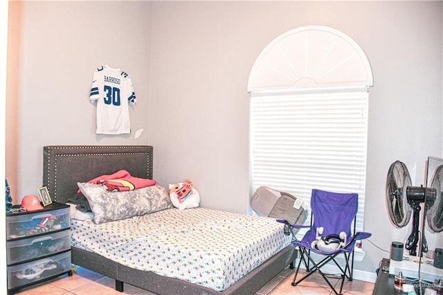 bedroom with tile patterned floors