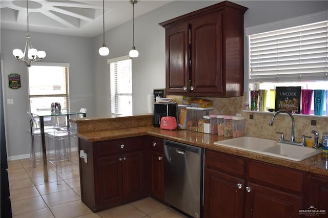 kitchen featuring dishwasher, light tile patterned floors, backsplash, and sink