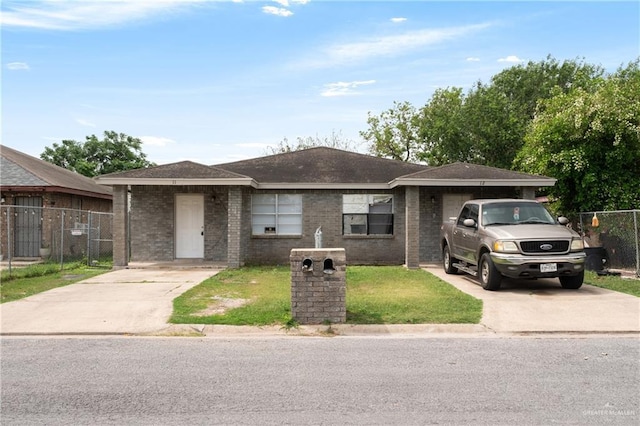 6614 Simon Place Ave, Brownsville, TX 78526 - single story home with concrete driveway and brick siding