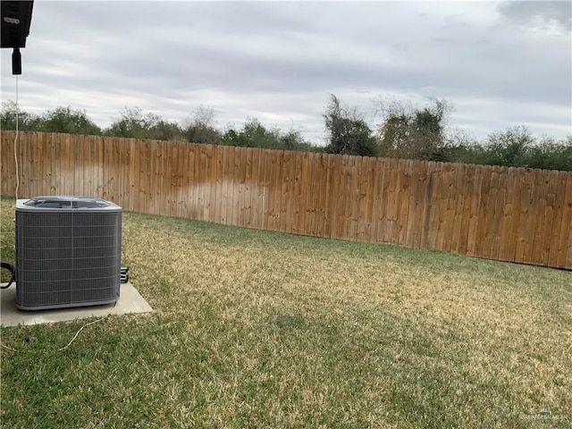 view of yard featuring central AC