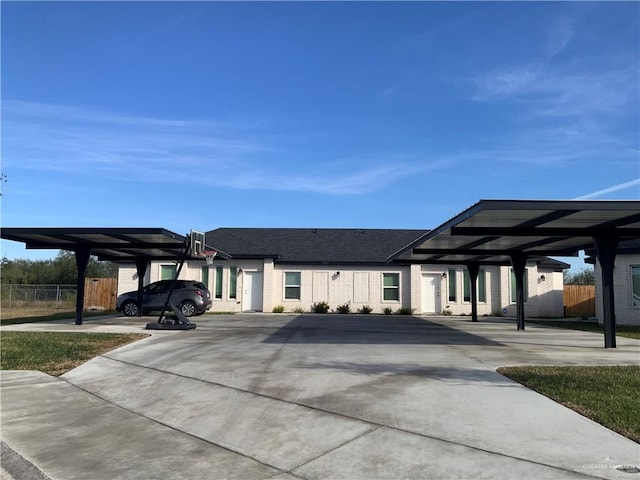 exterior space featuring a carport