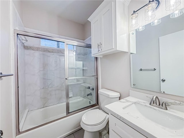 2817 Bluebird Ave, Mcallen, TX 78504 - bathroom featuring vanity, shower / bath combination with glass door, and toilet