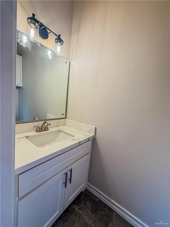 2817 Bluebird Ave, Mcallen, TX 78504 - bathroom featuring vanity and baseboards