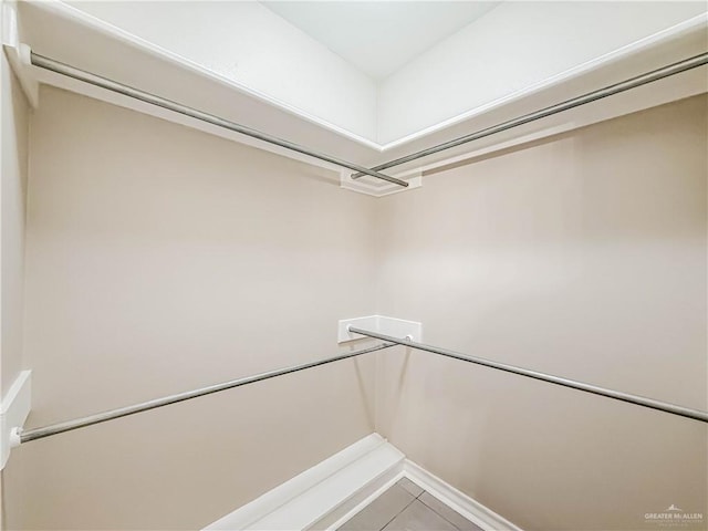 2817 Bluebird Ave, Mcallen, TX 78504 - spacious closet featuring light tile patterned floors