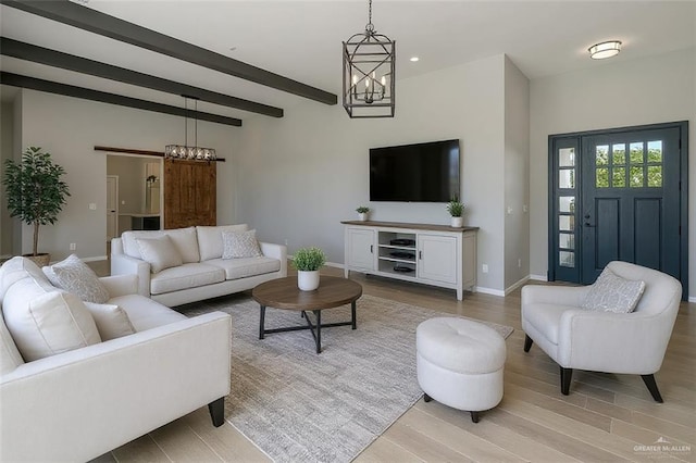 202 Constellation Dr E, Pharr, TX 78577 - living room with a chandelier, light wood-type flooring, beam ceiling, and recessed lighting