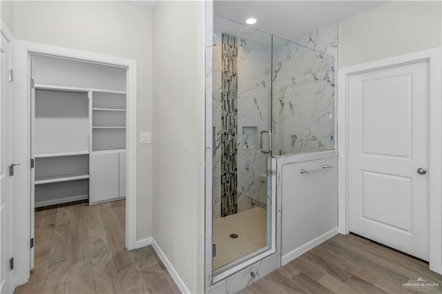 202 Constellation Dr E, Pharr, TX 78577 - full bath with a marble finish shower, a walk in closet, and recessed lighting