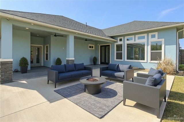202 Constellation Dr E, Pharr, TX 78577 - view of patio / terrace featuring french doors, an outdoor living space with a fire pit, and a ceiling fan