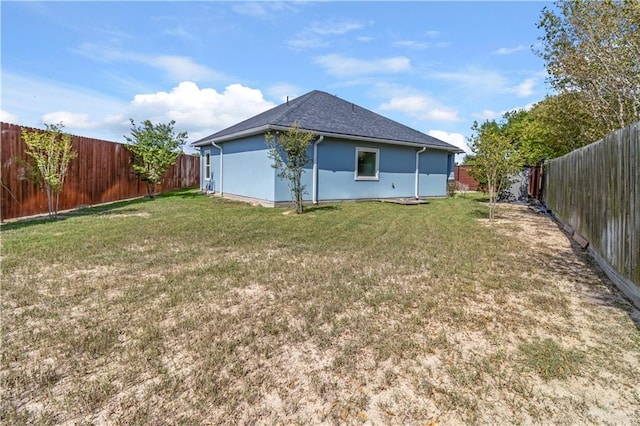 202 Constellation Dr E, Pharr, TX 78577 - rear view of house featuring a fenced backyard and stucco siding