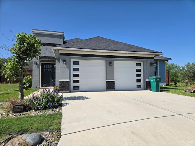 202 Constellation Dr E, Pharr, TX 78577 - view of front of property with a garage, driveway, roof with shingles, and stucco siding