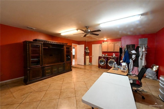 tiled office space featuring washer and dryer and ceiling fan