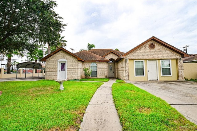 ranch-style house featuring a carport and a front lawn