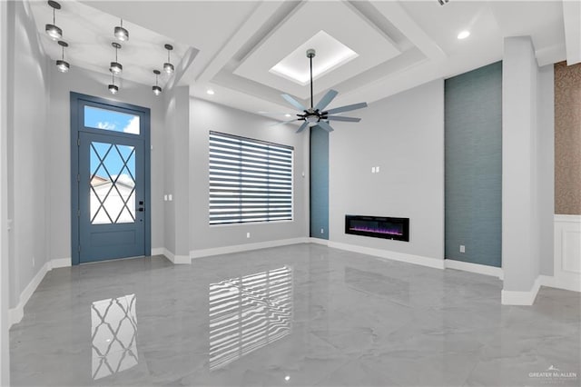 foyer entrance featuring ceiling fan