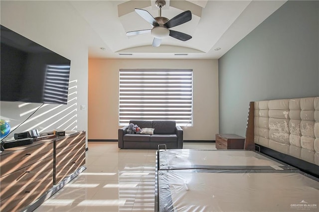 tiled bedroom featuring ceiling fan