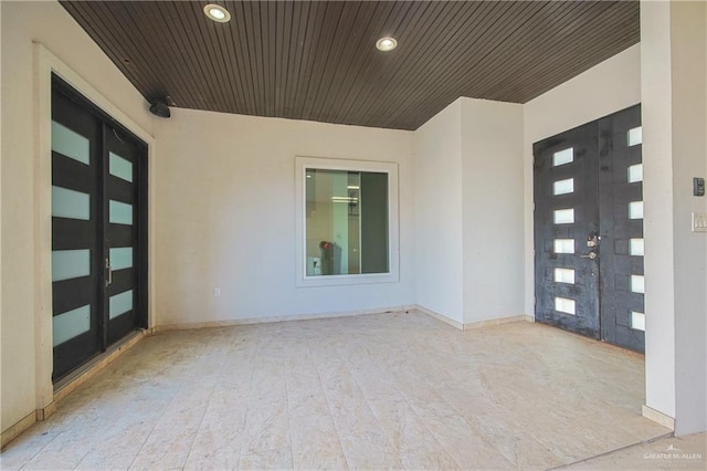 doorway to property featuring a patio