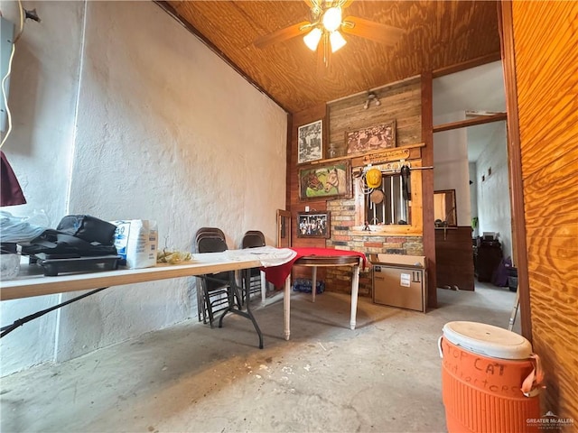 office space featuring concrete flooring and ceiling fan