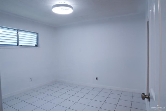 210 E Hurst St E, Harlingen, TX 78550 - unfurnished room featuring baseboards and light tile patterned floors
