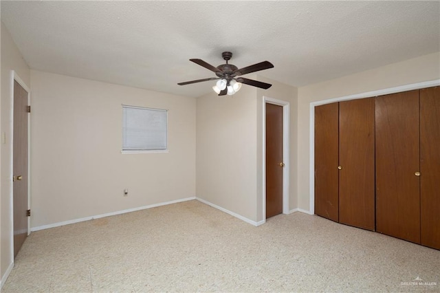unfurnished bedroom with a closet, ceiling fan, light carpet, and baseboards