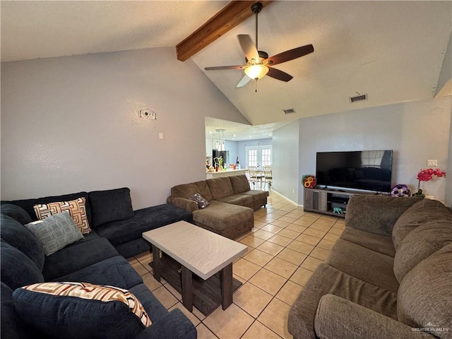 living area with vaulted ceiling with beams, light tile patterned floors, ceiling fan, and visible vents