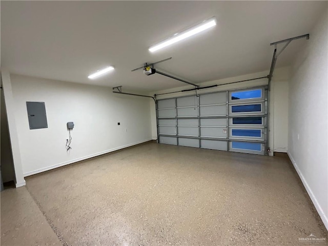 1513 Helen Dr, Weslaco, TX 78596 - garage featuring electric panel, a garage door opener, and baseboards