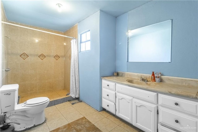 bathroom featuring walk in shower, vanity, tile patterned flooring, and toilet