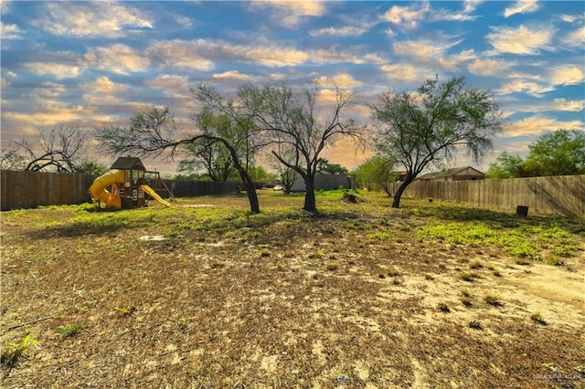 view of yard with a playground