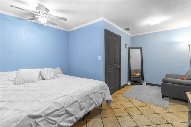 bedroom featuring ceiling fan, light tile patterned floors, and crown molding