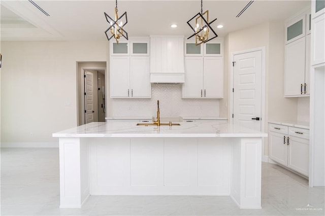 1608 Diplomat Dr, Edinburg, TX 78542 - kitchen with a chandelier, backsplash, a center island with sink, recessed lighting, and a sink