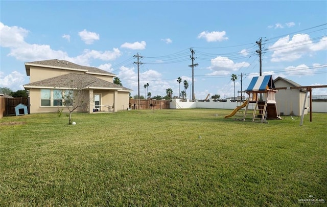 view of yard with a playground