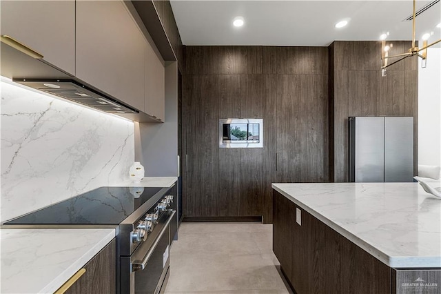 4916 N 26th St, Mcallen, TX 78504 - kitchen featuring stainless steel appliances, modern cabinets, dark brown cabinetry, and recessed lighting