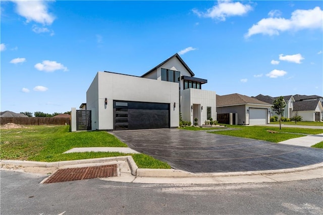 4916 N 26th St, Mcallen, TX 78504 - contemporary home featuring stucco siding, asphalt driveway, and an attached garage