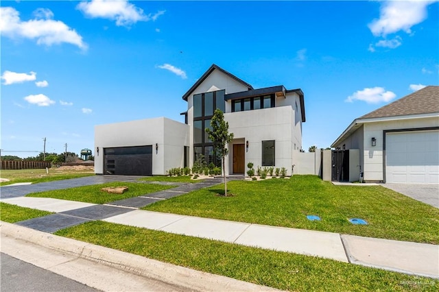 4916 N 26th St, Mcallen, TX 78504 - modern home featuring stucco siding and a front yard